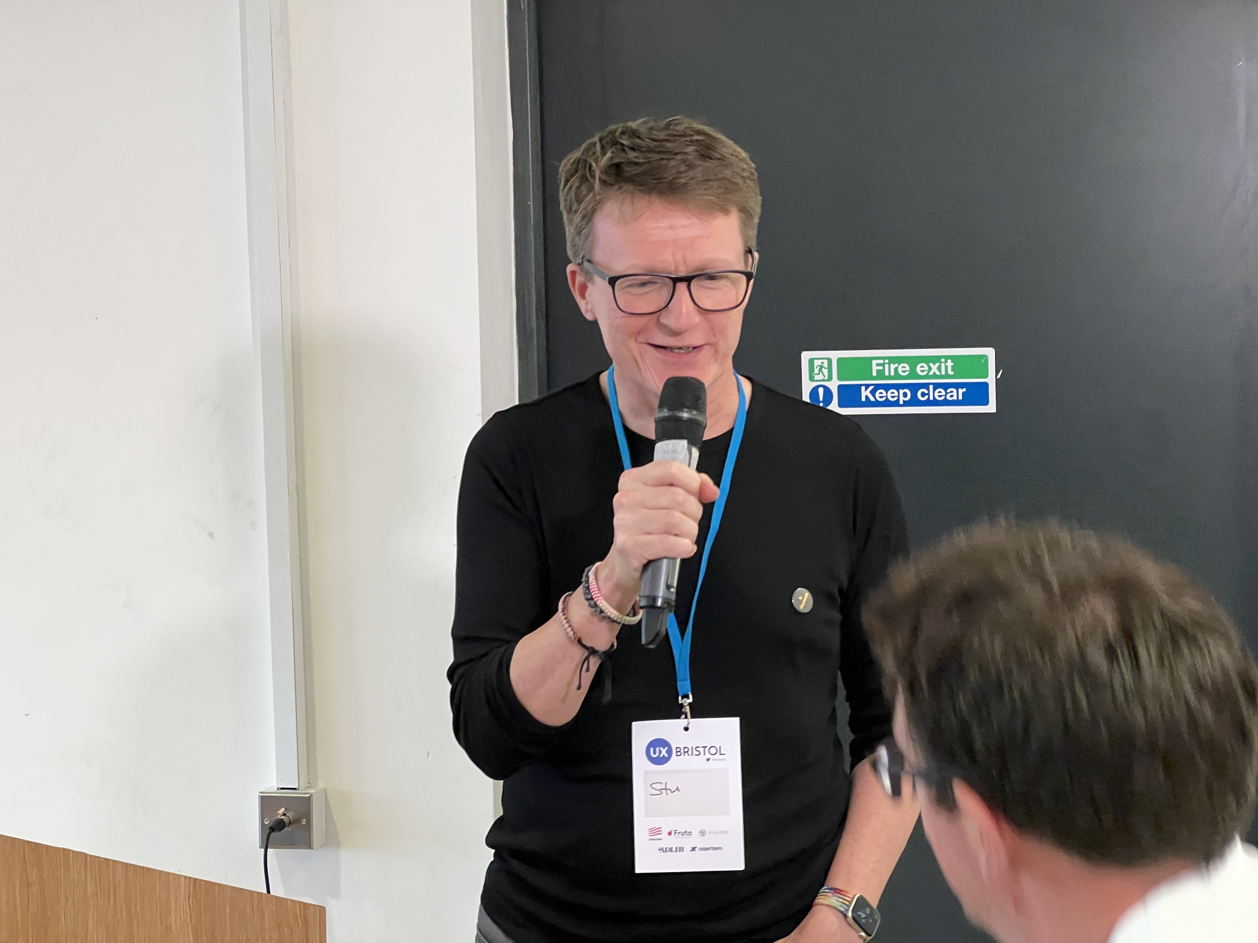 Stuart Church talking into a microphone